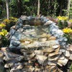 How to Build a Pond Waterfall With Concrete
